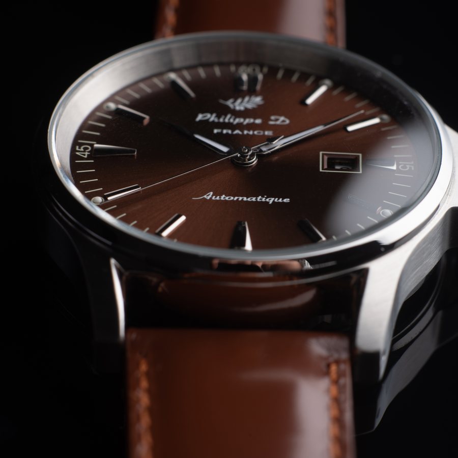 Montre à quartz boîtier inoxydable, aiguilles au choix